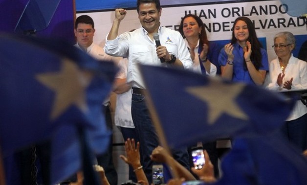 ELECTIONS. In this file photo, Honduran President Juan Orlando Hernandez addresses supporters following victory in the primary elections of the National Party in Tegucigalpa, March 12, 2017. Photo by AFP