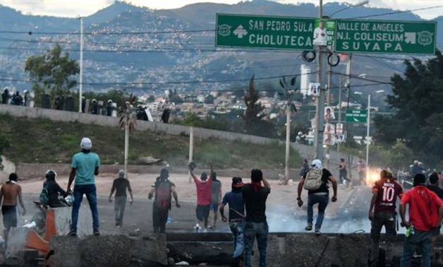 Supporters of opposition leader Salvador Nasralla clashed with police in Tegucigalpa-AFP