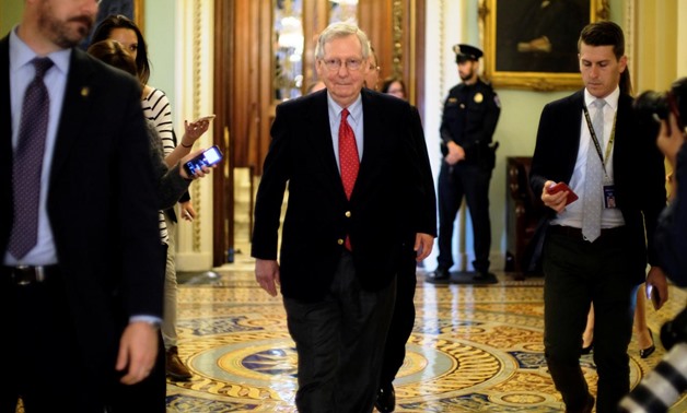 U.S. Senate Majority Leader Mitch McConnell (R-KY) leaves the Senate floor during debate over the Republican tax reform plan in Washington, U.S., December 1, 2017. REUTERS/James Lawler Duggan