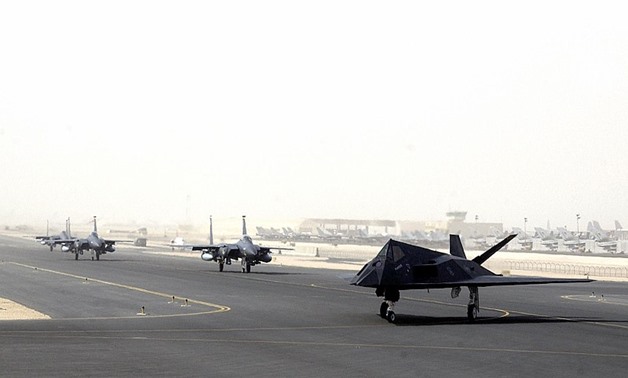 An F-117 and F-15s prepare to launch from Al Udeid Air Base, Qatar, during Operation Enduring Freedom – Wikimedia Commons