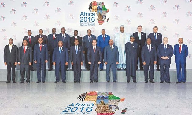 Egyptian President Abdel Fatah al-Sisi (centre) with other Heads of State and Government during Africa 2016 Forum – REUTERS