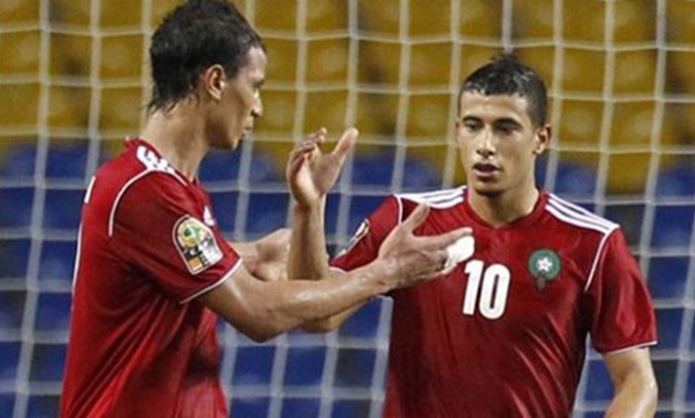 Morocco's Younes Belhanda (10) celebrates goal against Niger with team-mate Marouane Chamakh  - Photo courtesy of Reuters