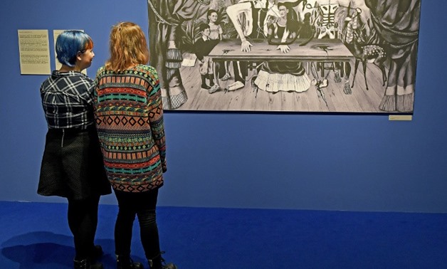 An exhibition in Poland has displayed a photo of Mexican artist Frida Kahlo's largest work, "The Wounded Table", which vanished in Warsaw more than half a century ago
