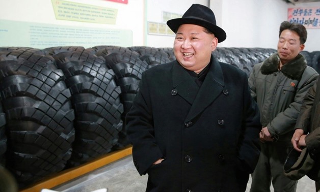 North Korean leader Kim Jong-Un visits the Amnokgang Tyre Factory, where tyres for the missile launcher used in the latest test were reportedly made
