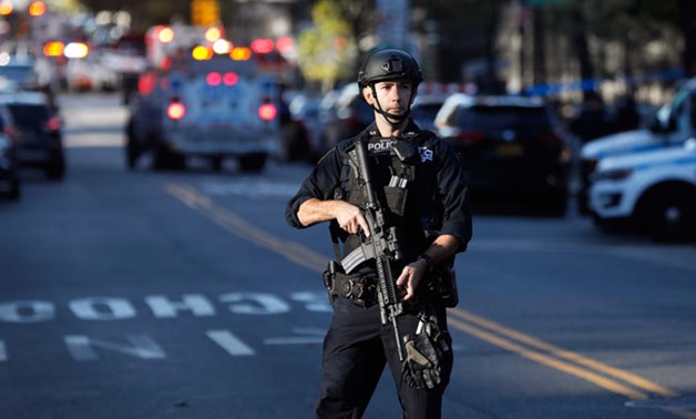 Police block off the street after a shooting incident in New York City - Reuters