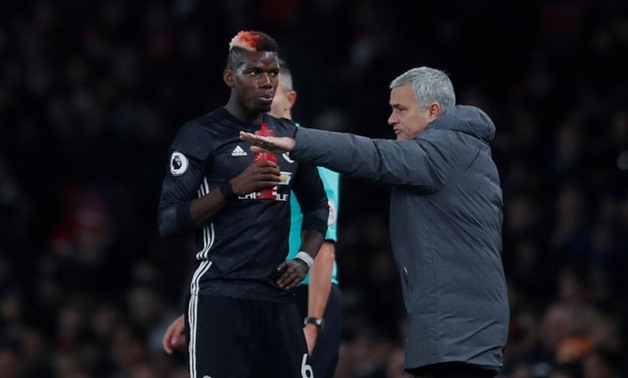 Soccer Football – Premier League – Arsenal vs Manchester United – Emirates Stadium, London, Britain, December 2, 2017, Manchester United manager Jose Mourinho with Paul Pogba Action Images – Reuters/Andrew Couldridge 