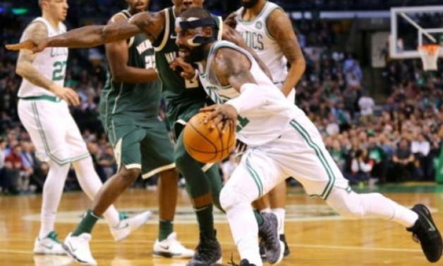 Kyrie Irving made 13-of-24 from the floor, including 19 points in the second half, as the Boston Celtics overcame the Milwaukee Bucks 111-100 -  AFP/GETTY
