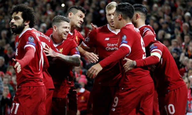 Soccer Football - Champions League - Liverpool vs Spartak Moscow - Anfield, Liverpool, Britain - December 6, 2017 Liverpool's Philippe Coutinho celebrates scoring their second goal with team mates Action Images via Reuters/Carl Recine