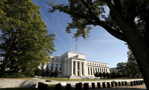 FILE PHOTO: The Federal Reserve headquarters in Washington September 16 2015. REUTERS/Kevin Lamarque/File Photo