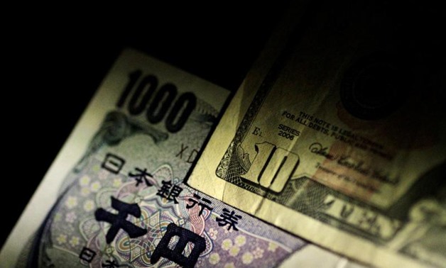 U.S. Dollar and Japan Yen notes are seen in this June 22, 2017 illustration photo. REUTERS/Thomas White/Illustration
