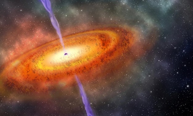Artist's conception of the most-distant supermassive black hole ever discovered, which is part of a quasar from just 690 million years after the Big Bang is shown in this illustration released on December 6, 2017. Courtesy Robin Dienel/Carnegie Institutio