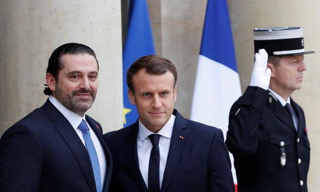 French President Emmanuel Macron and Saad al-Hariri, who announced his resignation as Lebanon's prime minister while on a visit to Saudi Arabia, are pictured at the Elysee Palace in Paris, France, November 18, 2017. REUTERS/Gonzalo Fuentes
