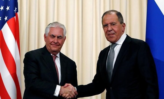 Russian Foreign Minister Sergei Lavrov shakes hands with U.S. Secretary of State Rex Tillerson during a news conference following their talks in Moscow, Russia, April 12, 2017. REUTERS/Sergei Karpukhin

