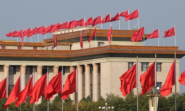 Red flags are seen on the top of the Great Hall of the People during the ongoing 19th National Congress of the Communist Party of China, in Beijing, China October 23, 2017. REUTERS/Jason Lee
