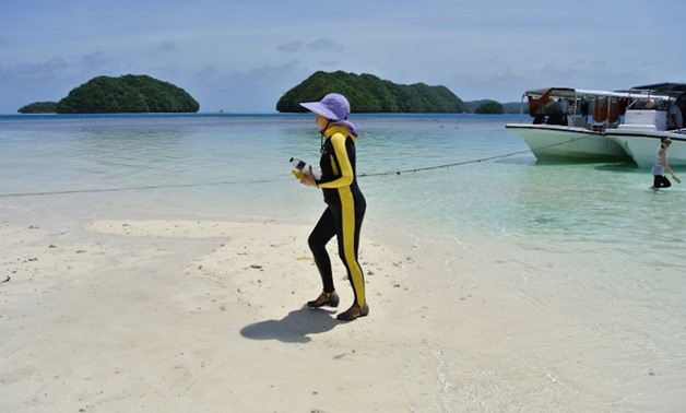 Visitors to the tiny Pacific nation of Palau are being made to sign a promise to respect the environment, in an innovative move that authorities hope will curb ecological damage caused by booming numbers of tourists - AFP