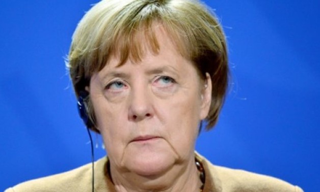 © dpa/AFP/File | German Chancellor Angela Merkel will meet leaders of the Social Democrats next Wednesday, ten weeks after an inconclusive general election left German politics deadlocked