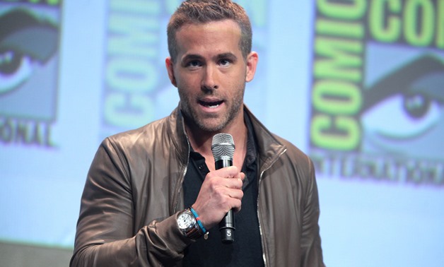 Photograph of Ryan Reynolds speaking at the 2015 San Diego Comic Con, July 11, 2015 – Flickr/Gage Skidmore