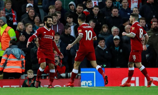 Soccer Football - Premier League - Liverpool vs Southampton - Anfield, Liverpool, Britain - November 18, 2017 Liverpool's Mohamed Salah celebrates with Philippe Coutinho after scoring their second goal Action Images via Reuters/Jason Cairnduff