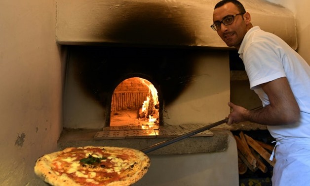 Naples' art of pizza twirling has joined UNESCO's list of 'intangible heritage'

