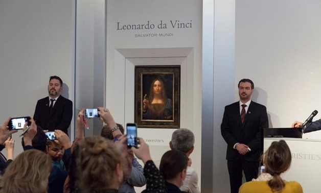 Salvator Mundi," an ethereal portrait of Jesus Christ which dates to about 1500, the last privately owned Leonardo da Vinci painting, is on display for the media at Christie's auction in New York, NY, U.S., October 10, 2017. Courtesy Christie’s New York/H
