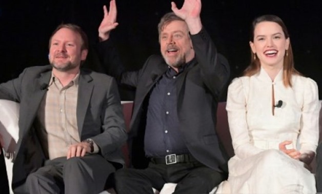  "Star Wars: The last Jedi" -- directed by Rian Johnson (L) -- picks up directly where the previous film left off, with Rey (Daisy Ridley, R) looking to Luke Skywalker (Mark Hamill, C) to teach her about The Force - AFP/File / by Frankie TAGGART
