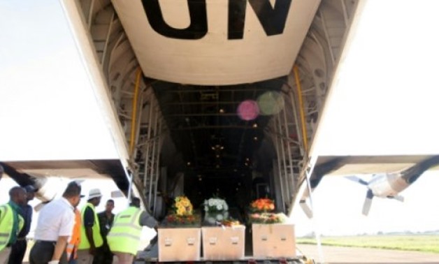 © AFP/File | Coffins of eight UN Guatemalan peacekeepers killed in a clash with armed men in far eastern DRCongo, arrive at Entebbe International Airport, in January, 2006