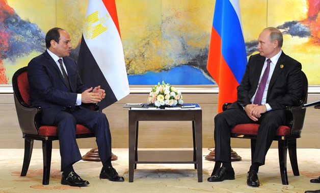 President Abdel Fatah al-Sisi Meets Russian President Vladimir Putin during the BRICS Summit in China on September 4, 2017 - Press Photo
