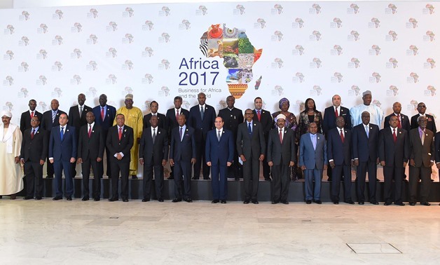 President Abdel Fatah al-Sisi and African leaders pose for a photo in the second day of the Africa 2017 Forum on Friday - press photo