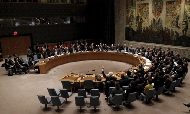 The United Nations Security Council votes to approve a resolution that would dramatically tighten existing restrictions on North Korea at the United Nations Headquarters in New York March 2, 2016. REUTERS/Brendan McDermid