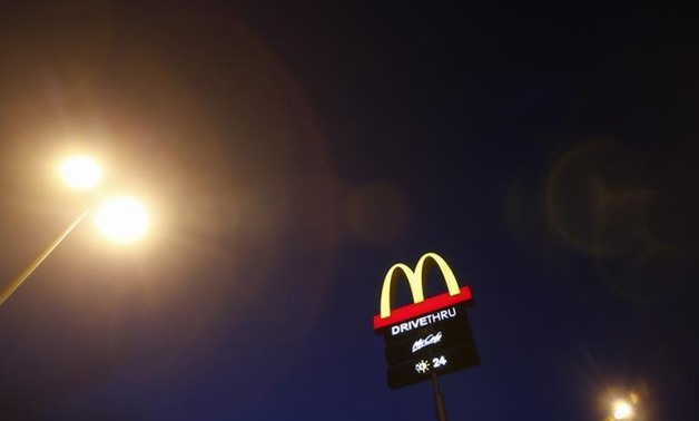 The corporate logo of McDonald's Corp fast food chain is seen on display in the Malaysian town of Pekan May 4, 2013. REUTERS/Bazuki Muhammad
