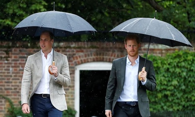 Britain's Prince William, Duke of Cambridge and Prince Harry visit the White Garden in Kensington Palace in London, Britain August 30, 2017. REUTERS/Kirsty Wigglesworth/Pool