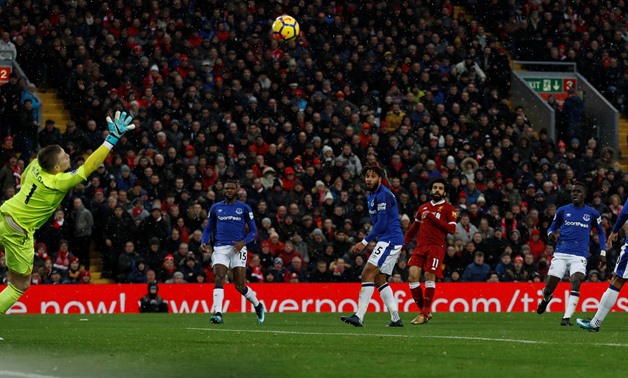 Premier League - Liverpool vs. Everton - Anfield, Liverpool, Britain - December 10, 2017 Liverpool's Mohamed Salah scores their first goal past Everton's Jordan Pickford Action Images - Reuters/Lee Smith
