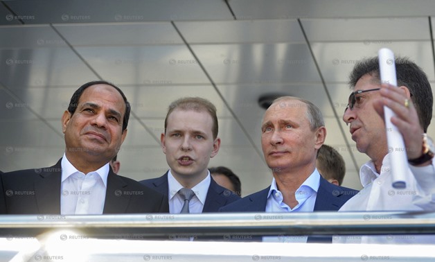 Russia's President Vladimir Putin (2nd R) and his Egyptian counterpart Abdel Fattah al-Sisi (L) visit the Laura Cross-country Ski and Biathlon Center in Sochi, August 12, 2014. REUTERS/Alexei Druzhinin/RIA Novosti/Kremlin