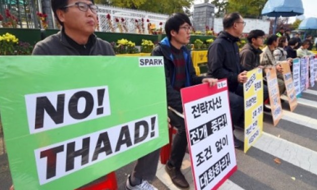 © AFP/File | Seoul and Washington decided to install the powerful US THAAD system in the South earlier this year