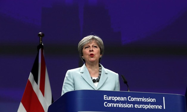 FILE PHOTO - Britain's Prime Minister Theresa May speaks at a news conference at the EC headquarters in Brussels, Belgium December 8, 2017. REUTERS/Yves Herman