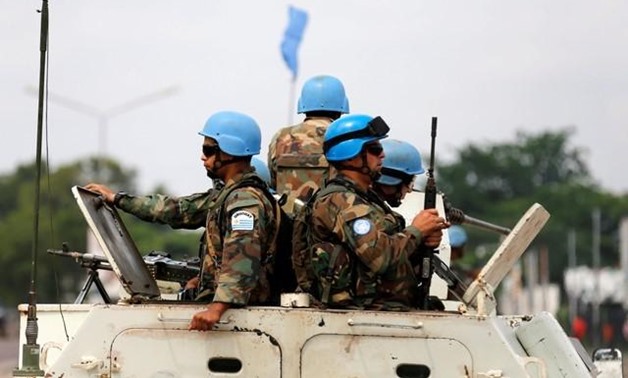 Peacekeepers serving in the United Nations Organization Stabilization Mission in the Democratic Republic of the Congo (MONUSCO) patrol in their armoured personnel in the streets of the Democratic Republic of Congo's capital Kinshasa, December 20, 2016. RE
