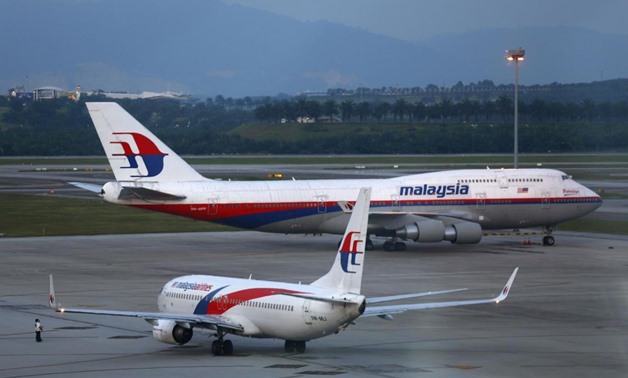 Malaysia Airlines aircrafts taxi on the runway at Kuala Lumpur International Airport in Sepang outside Kuala Lumpur May 13, 2014. REUTERS/Samsul Said
