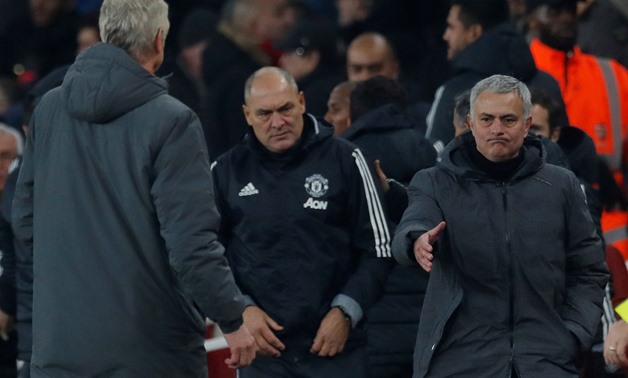 Premier League - Arsenal vs Manchester United - Emirates Stadium, London, Britain - December 2, 2017 Manchester United manager Jose Mourinho gestures to shake hands with Arsenal manager Arsene Wenger after the match Action Images via Reuters/Andrew Couldr