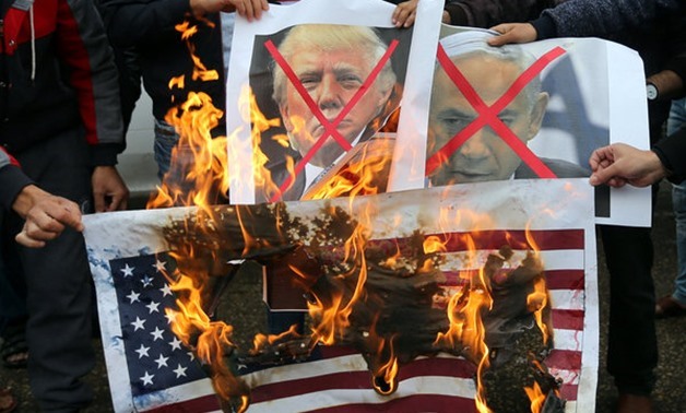 FILE - Demonstrators shout slogans during protests against the U.S. declaration to move its embassy to Jerusalem and to recognize the city as the capital of Israel December 6, 2017 - REUTERS