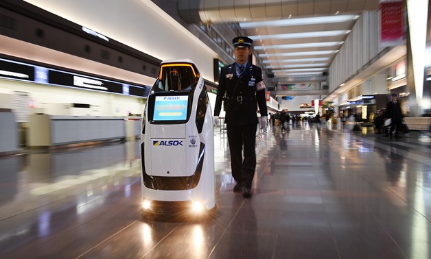 The security and guide robot 'Reborg-X' produced by Japan's security company Alsok is demonstrated at a departure floor of Tokyo's Haneda Airprit on December 12, 2017. — AFP pic