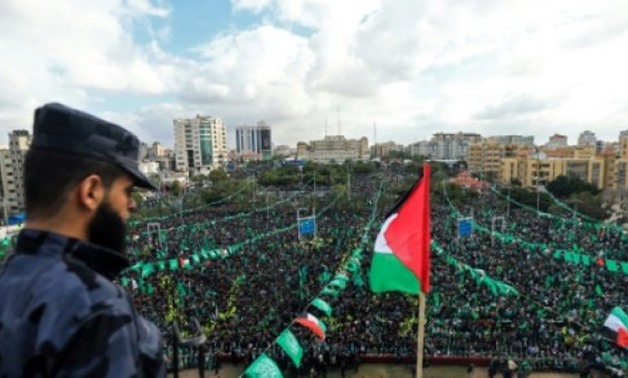 © AFP | Hamas supporters take part in a rally marking the 30th anniversary of the founding of the Islamist movement, in Gaza City, on December 14, 2017
