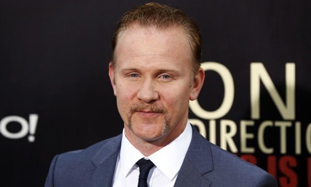 Director Morgan Spurlock arrives for the premiere of the documentary film "This is Us" about British boy band One Direction in New York, August 26, 2013. REUTERS/Lucas Jackson