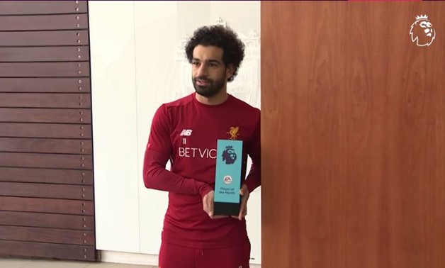 Mohamed Salah with the EA Sports Player of the Month award - Premier League’s official website 