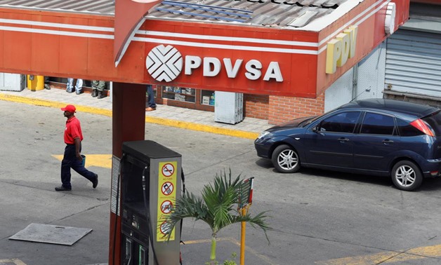 The corporate logo of the state oil company PDVSA is seen at a gas station in Caracas, Venezuela November 22, 2017. REUTERS/Marco Bello