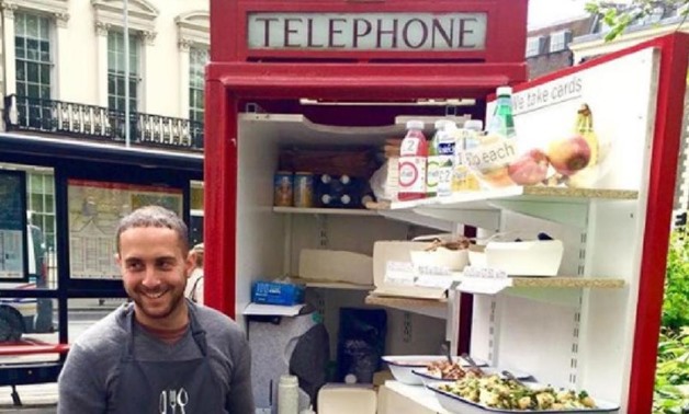 A phone box that has been converted into a salad bar holds a tiny refrigerator and shelves to put the dishes on. AFP, (Spier’sSalads/Instagram)
