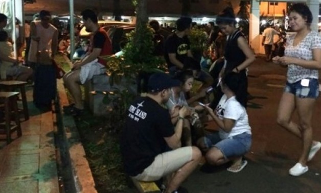 © AFP | Residents gather outside their apartment blocks in Jakarta following a strong earthquake