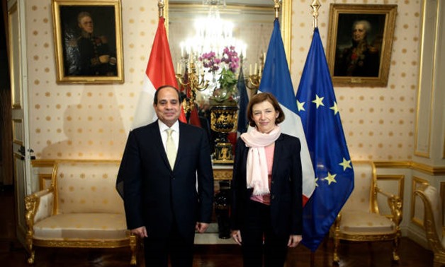 French Defence Minister Florence Parly (R) poses with Egyptian President Abdel-Fatah al-sisi