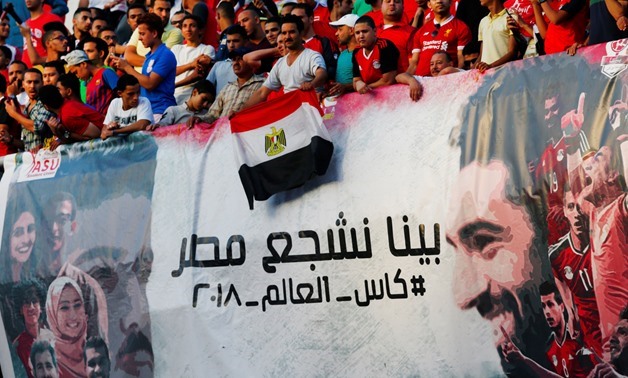 Egypt fans display a banner showing Mohamed Salah – Press image courtesy Reuters 