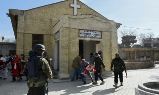 © AFP | Officials said security forces intercepted and shot one bomber outside but the second attacker managed to reach the church's main door where he blew himself up