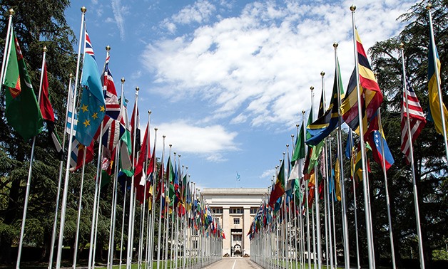 UN flags at Geneva HQ- Creative Commons via Wikimedia Commons/Tom Page